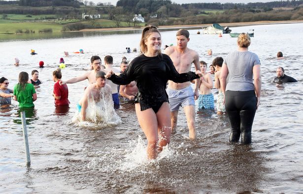 Swimmers young and old braved the freezing waters of Loch Ken