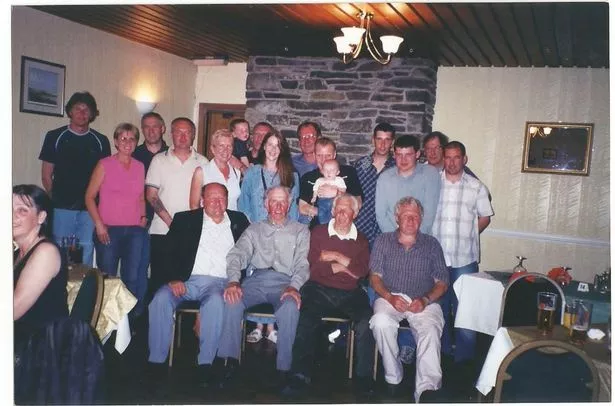 The McGuire family celebrates Ernie's 80th birthday at the Isle in 2005. Shaun is at the back, centre.