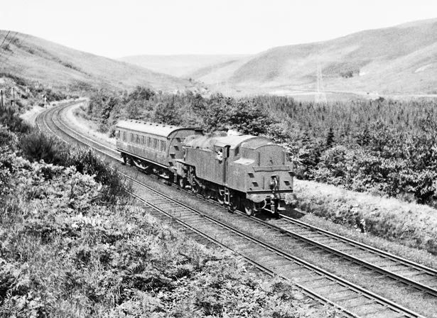 The Saturdays only staff and family train near Greskine in the early 1960s. took railway families to Moffat to obtain their weekly shop