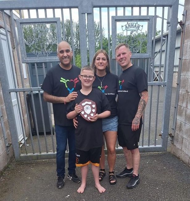 Hardip Atwal was thanked for his support and providing the shield, pictured with Jaiden, Leanne and Jimmy