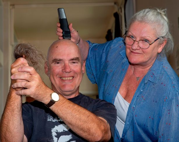 Harry Thomson gets a shave and crop from Maureen Tait